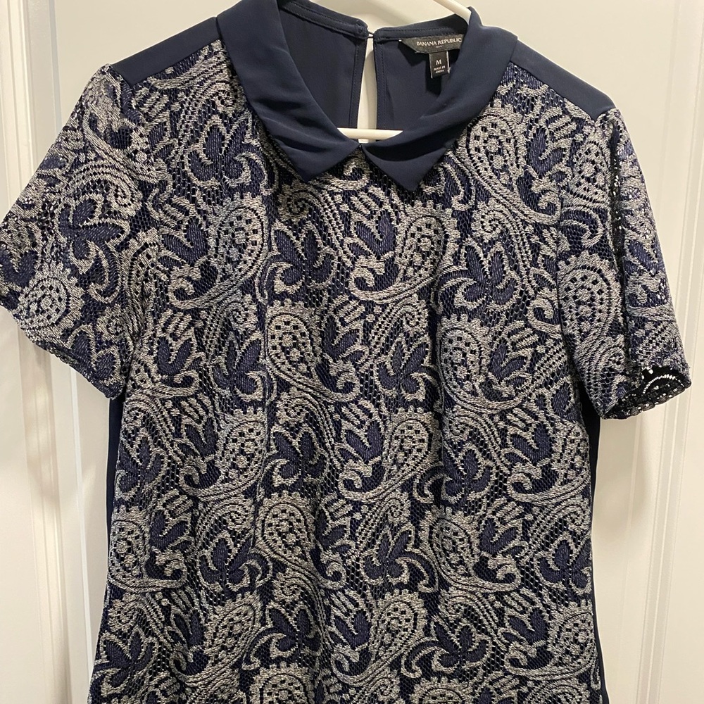 Peter Pan collar blouse.